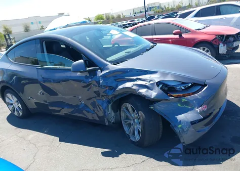 2023 Tesla Model Y Awd/Long Range Dual Motor All-Wheel Drive из США, поврежденный, VIN 7SAYGDEE7PF851849